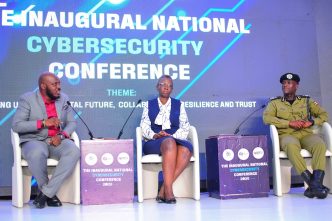 Johnson Tumusiime, Governance and Risk Manager at NITA-Uganda, Eng. Christine Mugimba, Director of ICT and Research at UCC, and ACP. Andrew Mubiru, Director of Forensic Science at Uganda Police Force during a panel session at the inaugural National Cybersecurity Conference. COURTESY PHOTO